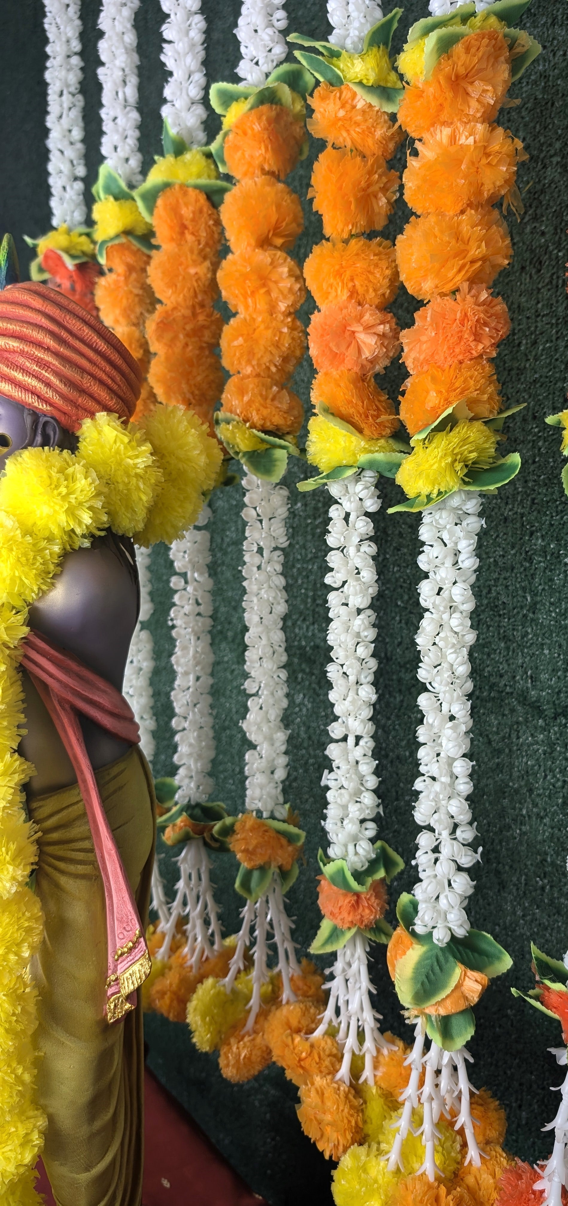 Jasmine and marigold Garland with latkan at the end of string