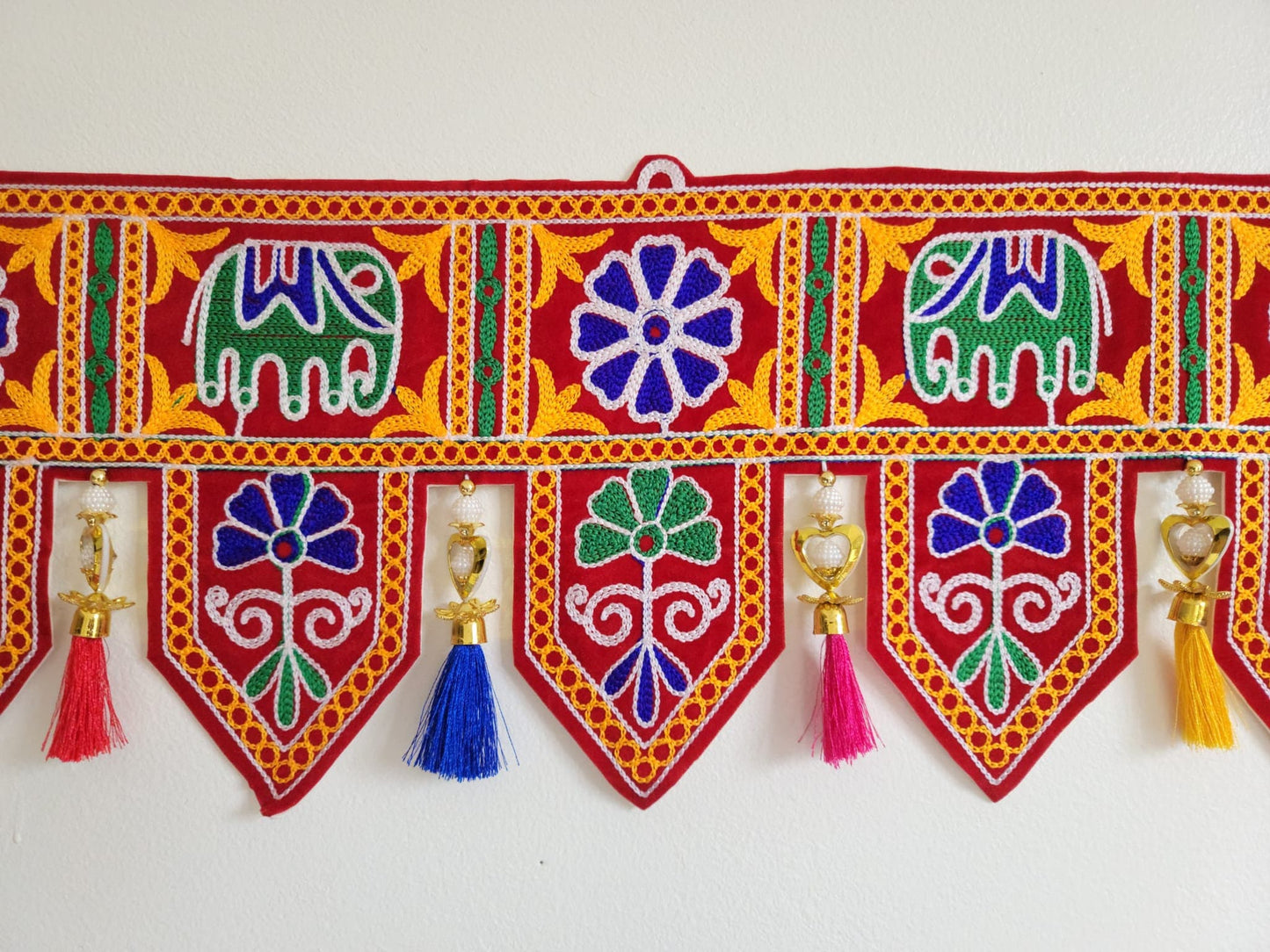 Bohemian elephant home decoration with colorful silk tassels, embroidered gypsy curtain, hippie door frame, Indian handmade ethnic tapestry. Great gift and decor for Diwali, house warming and auspicious events