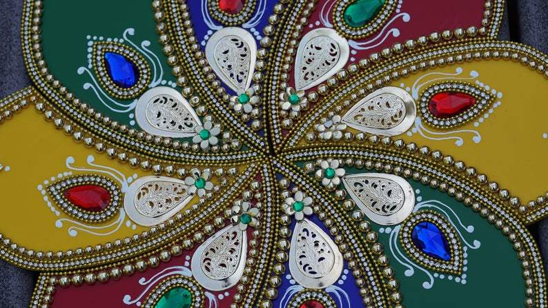 Hand crafted rangoli with painted diya wax candles. Great for tabletop decoration, Diwali, Christmas, henna and mehndi night
