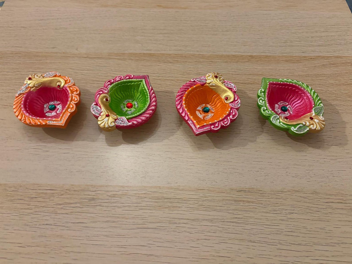 Hand-Painted Peacock Clay Diyas - Set of 4