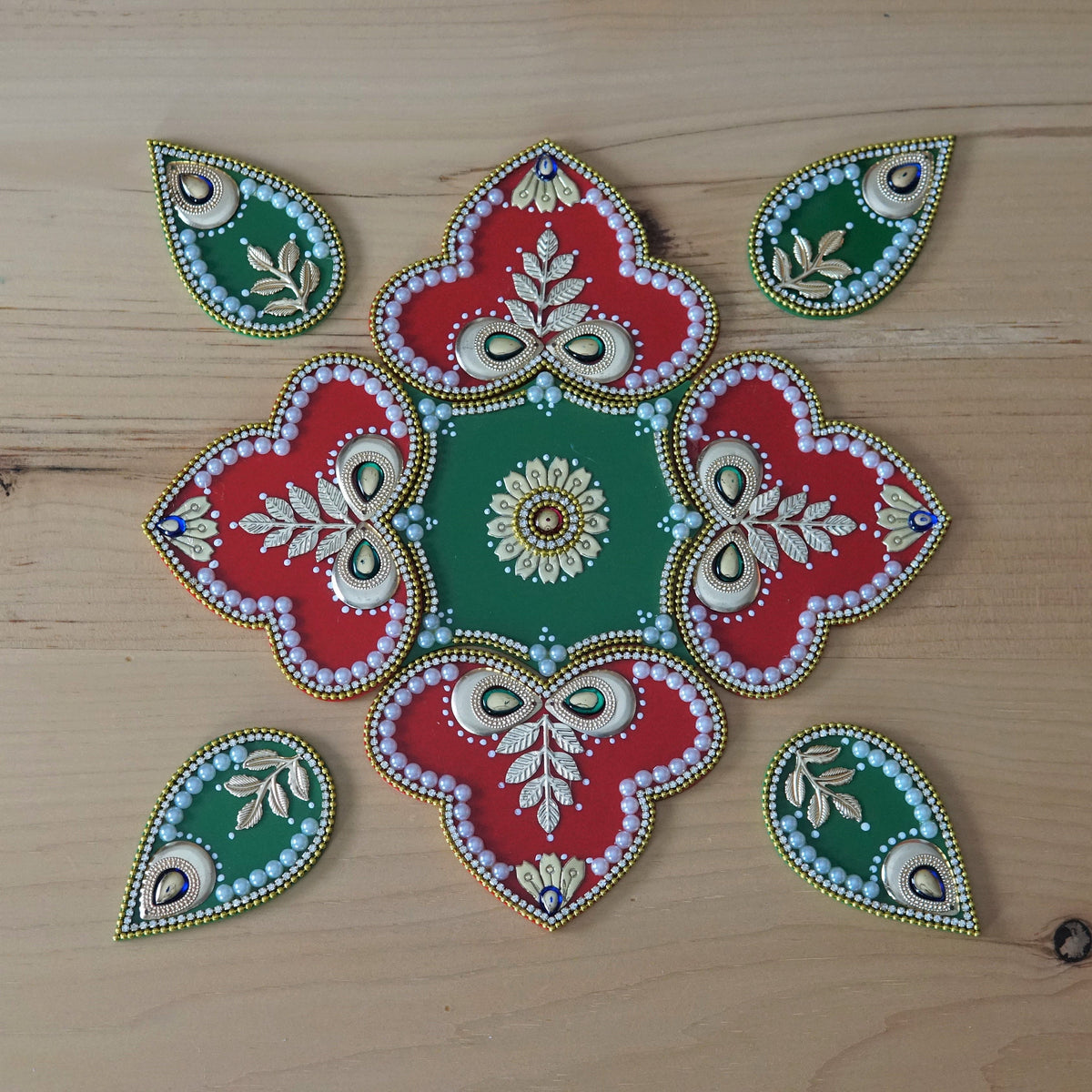 Red and Green Rangoli Set - 9 Pieces with 4 Wax Diyas - arrangement 2