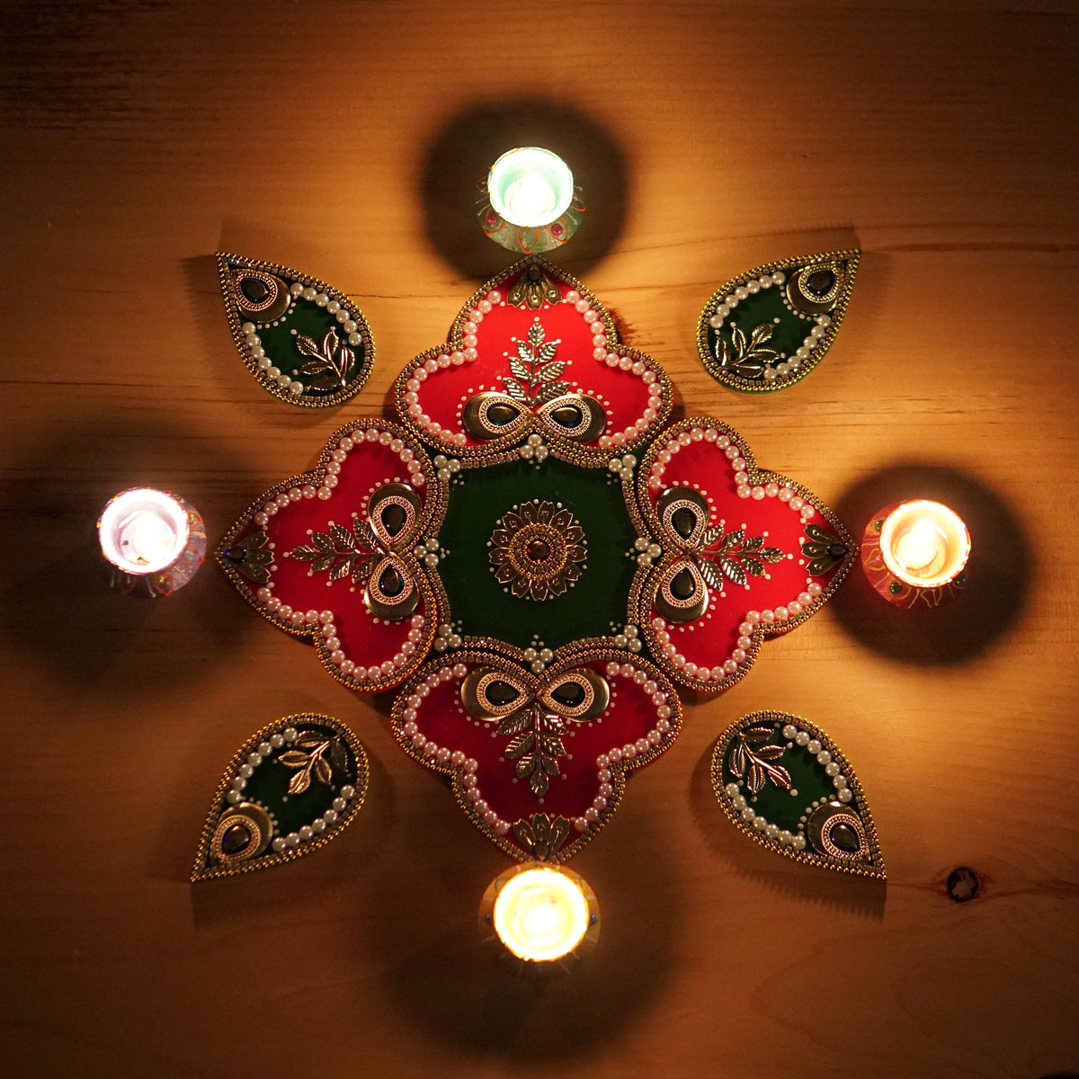 Red and Green Rangoli Set - 9 Pieces with 4 Wax Diyas - arrangement 1