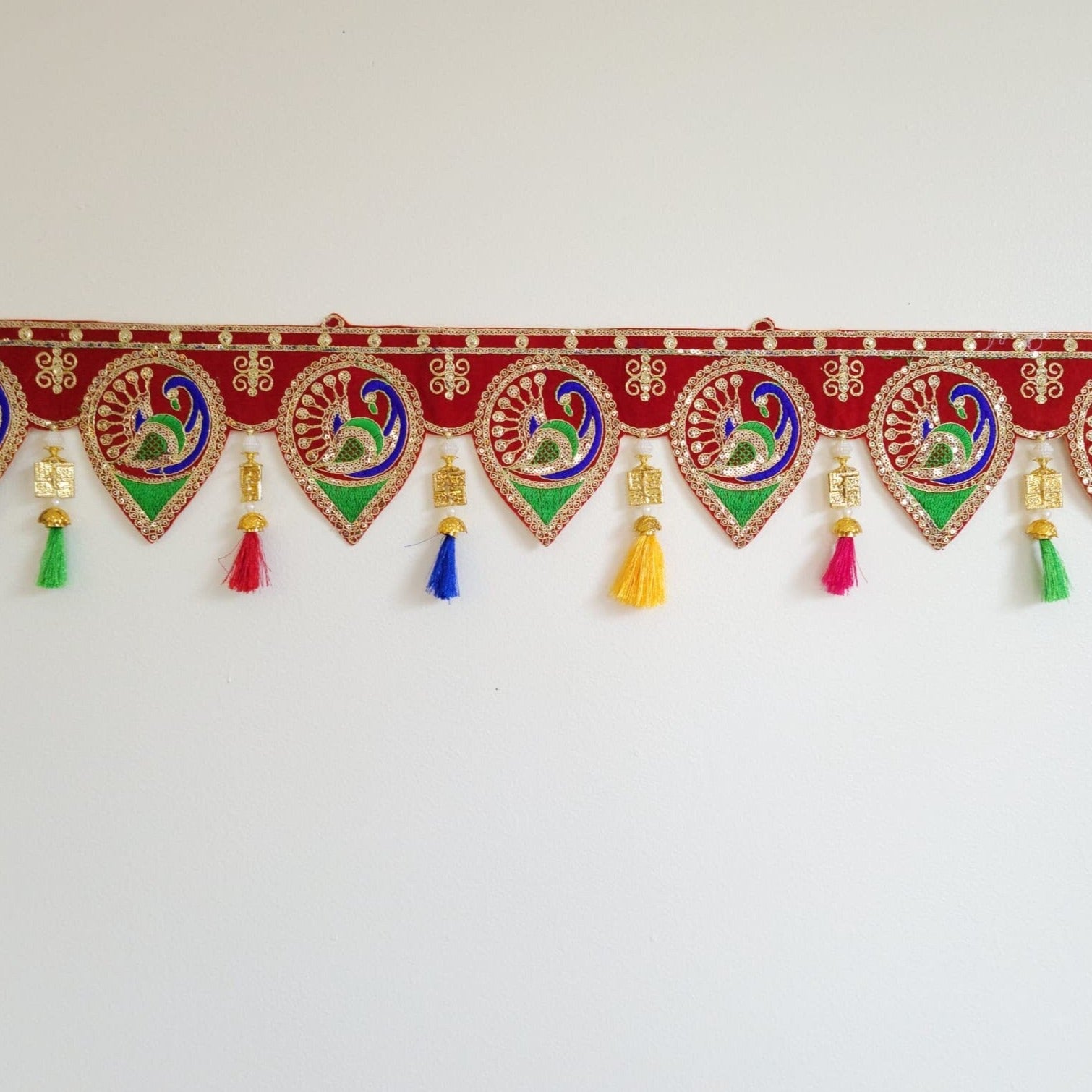 Bohemian Peacock home decoration with colorful silk tassels, embroidered gypsy curtain, hippie door frame, Indian handmade ethnic tapestry. Great gift and decor for Diwali, house warming and auspicious events