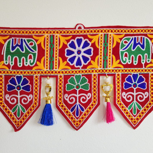 Bohemian elephant home decoration with colorful silk tassels, embroidered gypsy curtain, hippie door frame, Indian handmade ethnic tapestry. Great gift and decor for Diwali, house warming and auspicious events