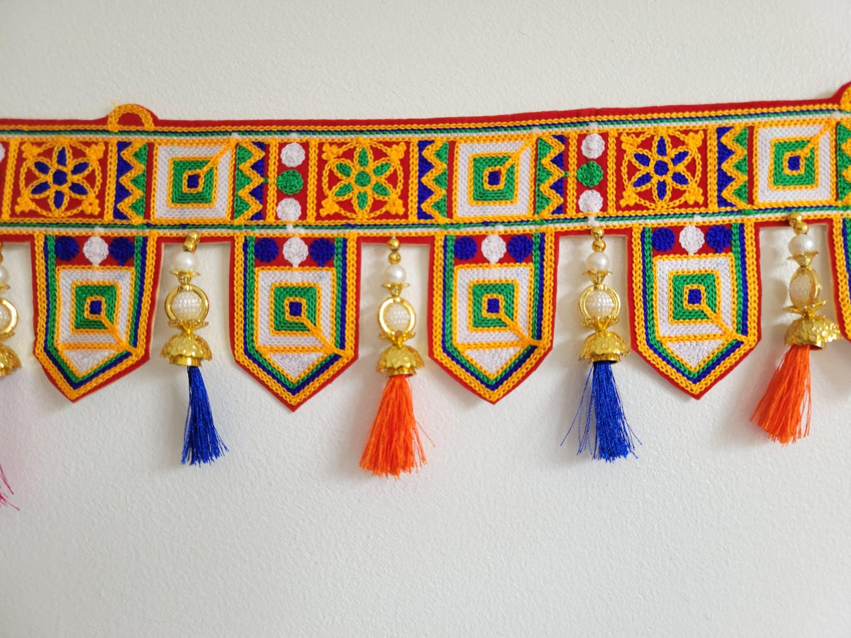 Geometric Embroidered Door Toran with Mirror Work and Silk Tassels - doorway view