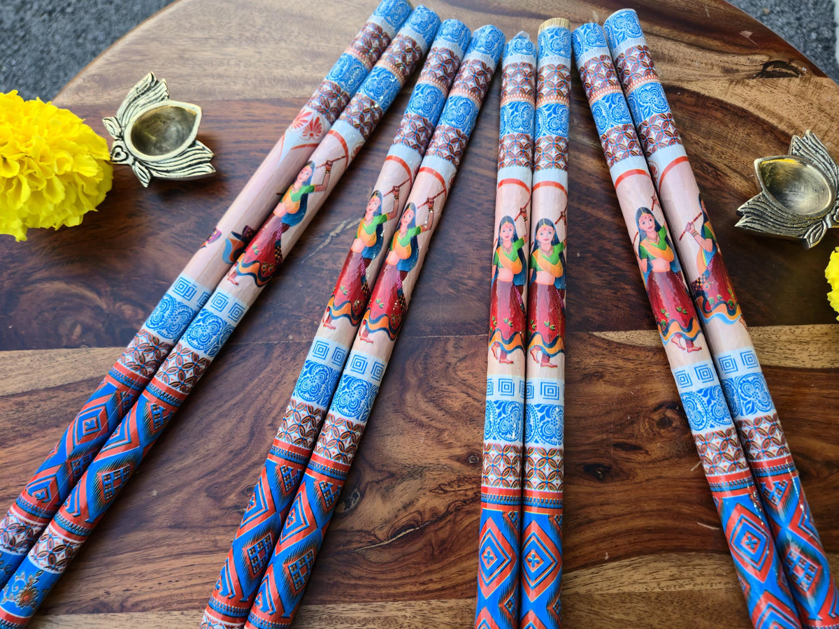 Assorted painted wooden dandiya sticks, Design 2; each stick is 15 inches long
