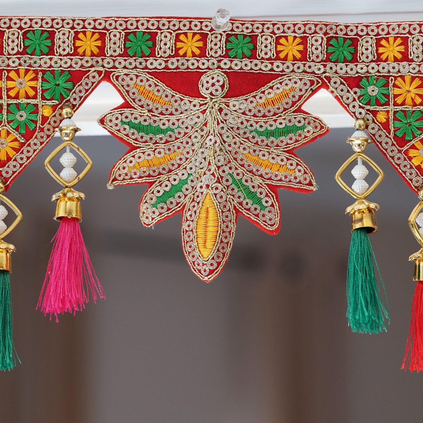 Indian bohemian door decoration with leaves embroidery - Aangan of India
