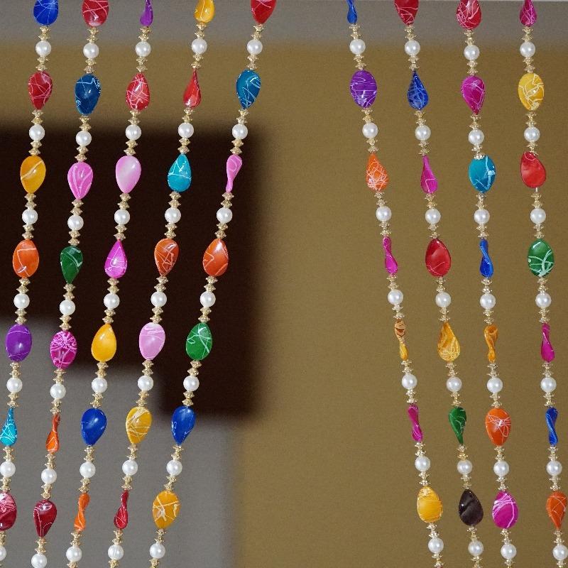 Hippie beaded suncather for window.