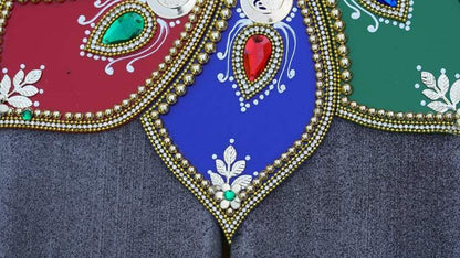 Tabletop decoration: hand-crafted rangoli with ruby and sapphire gems.  This colorful handmade rangoli can be decorated with flowers and diya candles to create relaxing environment during Diwali, Christmas, Henna Mehndi night.